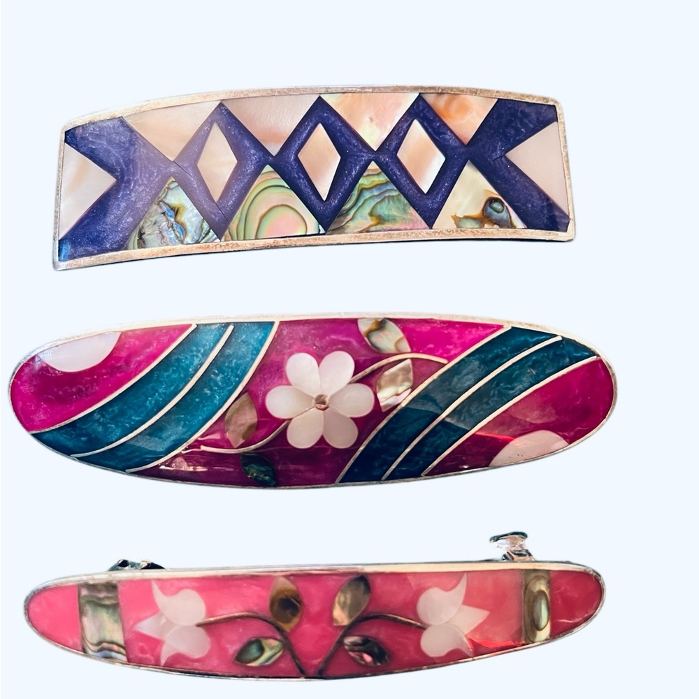 Three vintage enamel with mother of pearl hair clips